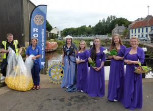 The herring Queen and maids ready to launch a 1000 ducks